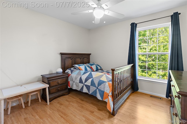48840 Greenwich Cir, Canton, MI 48188 - bedroom featuring light wood finished floors and ceiling fan