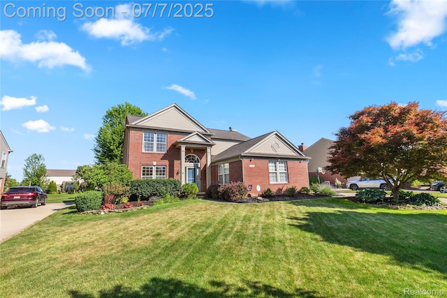 48840 Greenwich Cir, Canton, MI 48188 - traditional-style home featuring brick siding and a front lawn