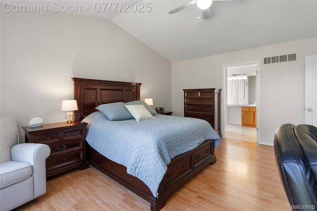 48840 Greenwich Cir, Canton, MI 48188 - bedroom with light wood finished floors, vaulted ceiling, a ceiling fan, and ensuite bath