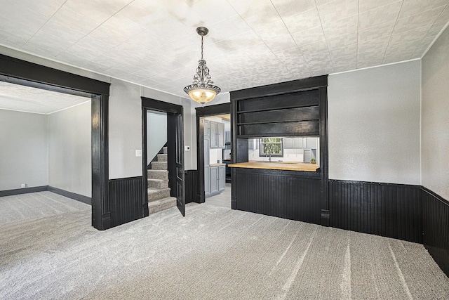 238 Maple Rd, Quincy, MI 49082 - empty room with carpet flooring and stairway