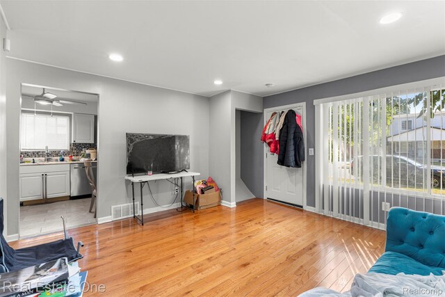 496 Lenoir Ave, River Rouge, MI 48218 - living area with light wood-style flooring, plenty of natural light, recessed lighting, and ceiling fan