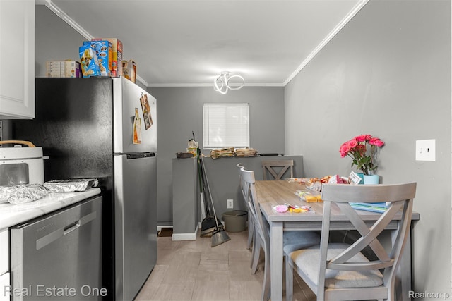 496 Lenoir Ave, River Rouge, MI 48218 - dining space featuring crown molding