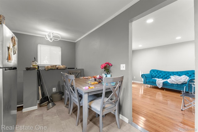 496 Lenoir Ave, River Rouge, MI 48218 - dining area with crown molding, wood finished floors, and recessed lighting