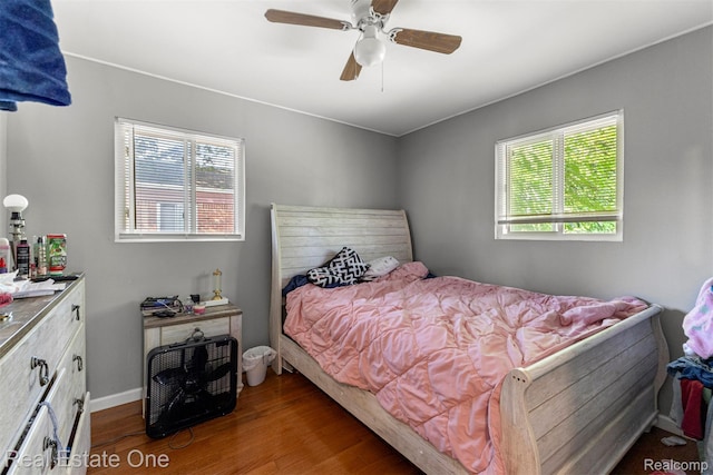 496 Lenoir Ave, River Rouge, MI 48218 - bedroom with dark wood finished floors and a ceiling fan