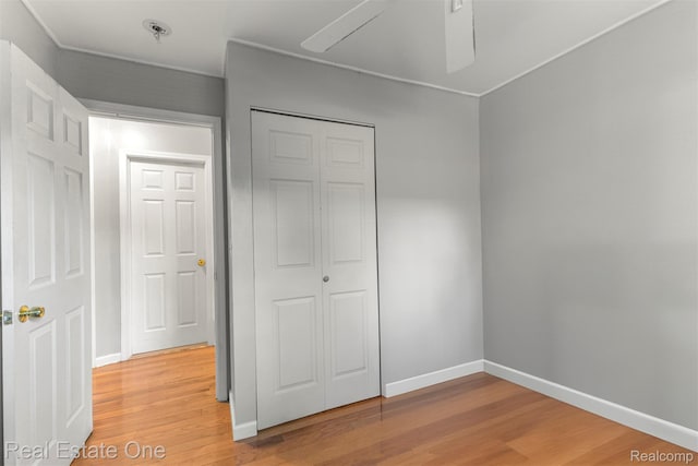 496 Lenoir Ave, River Rouge, MI 48218 - unfurnished bedroom featuring light wood-type flooring and a closet