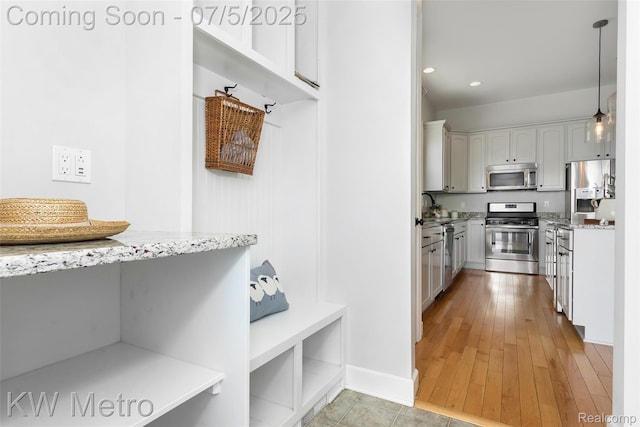 3666 Phillips Ave, Berkley, MI 48072 - mudroom featuring light wood-style floors and recessed lighting