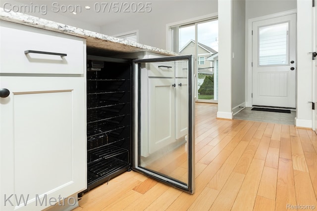 3666 Phillips Ave, Berkley, MI 48072 - mudroom featuring light wood-type flooring and beverage cooler