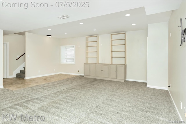 3666 Phillips Ave, Berkley, MI 48072 - carpeted empty room with recessed lighting and stairs