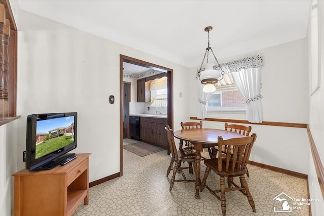 1534 London St, Lincoln Park, MI 48146 - dining area with baseboards