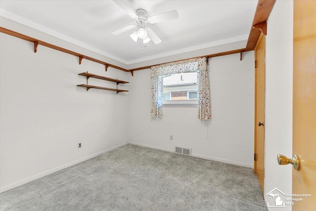 1534 London St, Lincoln Park, MI 48146 - unfurnished room featuring carpet floors, ceiling fan, and crown molding