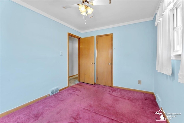 1534 London St, Lincoln Park, MI 48146 - unfurnished bedroom with carpet floors, ornamental molding, and a ceiling fan