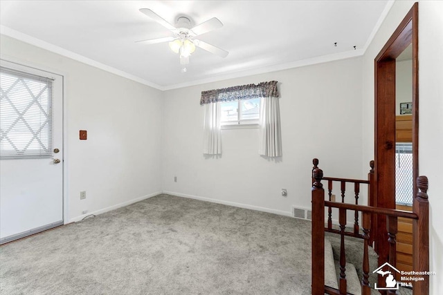 1534 London St, Lincoln Park, MI 48146 - carpeted empty room featuring a ceiling fan and ornamental molding