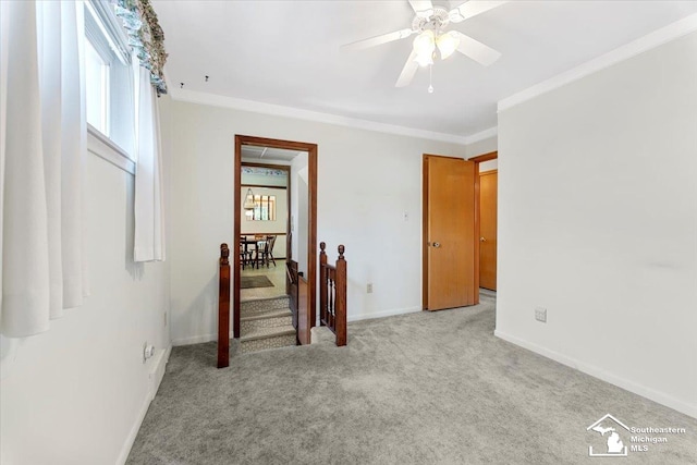 1534 London St, Lincoln Park, MI 48146 - carpeted spare room with plenty of natural light, ornamental molding, and ceiling fan