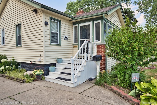 1726 Oxford Rd, Berkley, MI 48072 - property entrance featuring a chimney