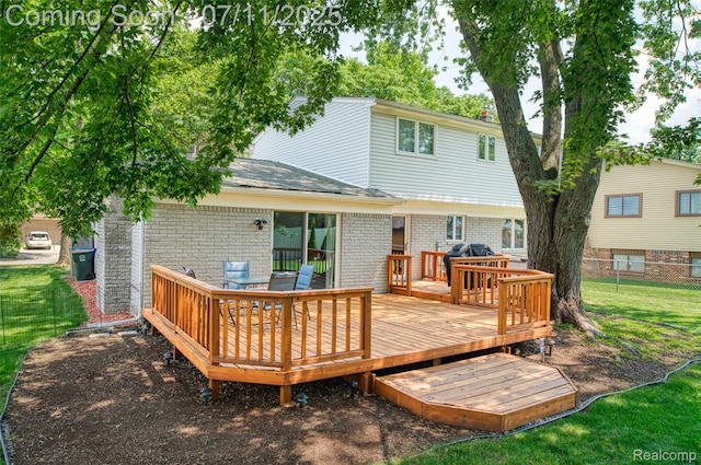 8527 Congress Dr, Canton, MI 48187 - back of property featuring brick siding, a wooden deck, and roof with shingles