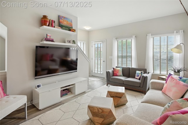3317 Parkways Blvd, Auburn Hills, MI 48326 - living area featuring wood finished floors and plenty of natural light