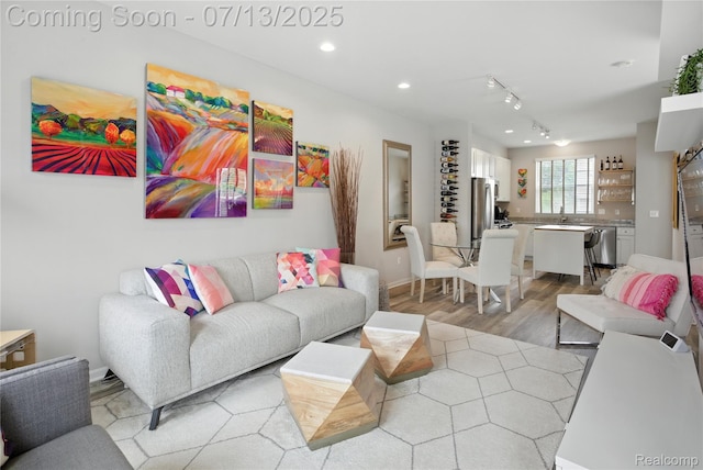 3317 Parkways Blvd, Auburn Hills, MI 48326 - living room with light wood-style floors and recessed lighting