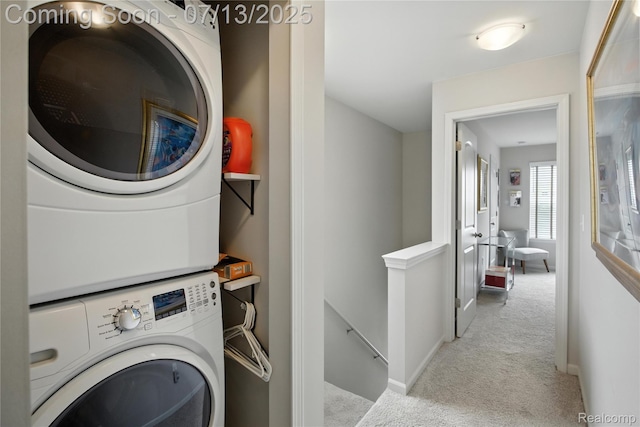 3317 Parkways Blvd, Auburn Hills, MI 48326 - washroom with stacked washing machine and dryer and carpet flooring