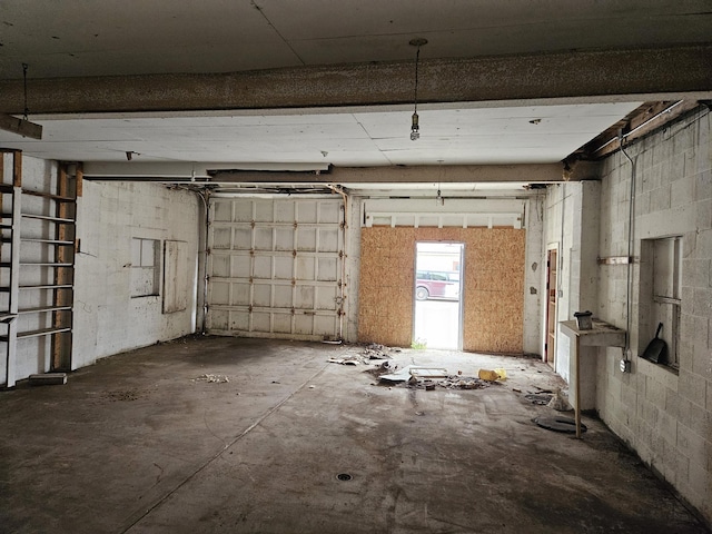 2768 W Winston Rd, Rothbury, MI 49452 - garage featuring concrete block wall