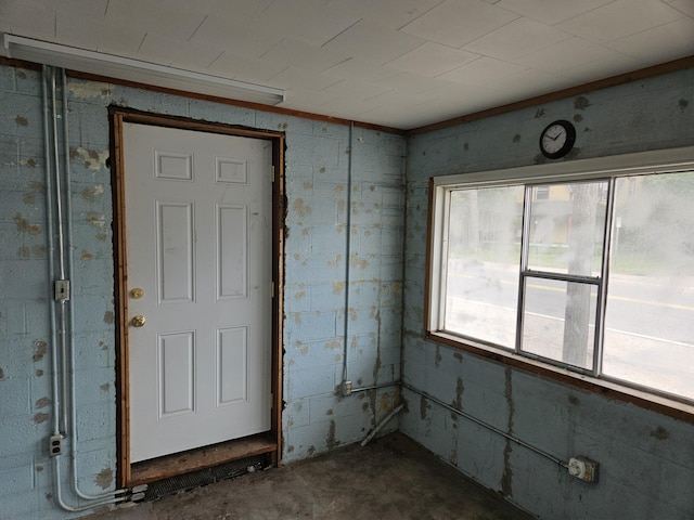 2768 W Winston Rd, Rothbury, MI 49452 - empty room featuring concrete floors