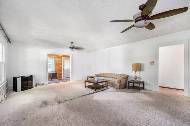 4471 Highland Ave, Benton Harbor, MI 49022 - carpeted living room featuring a ceiling fan