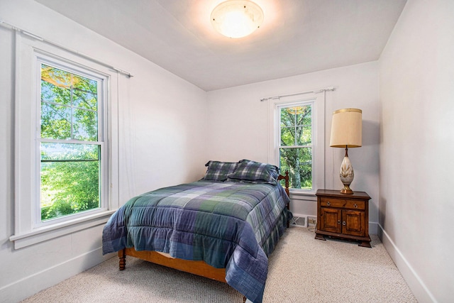 4471 Highland Ave, Benton Harbor, MI 49022 - bedroom with carpet flooring and baseboards