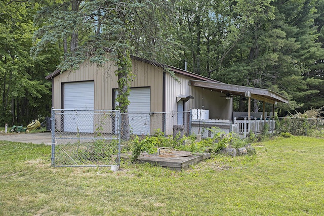 14083 M37, Battle Creek, MI 49017 - view of home's exterior with a garage and an outdoor structure