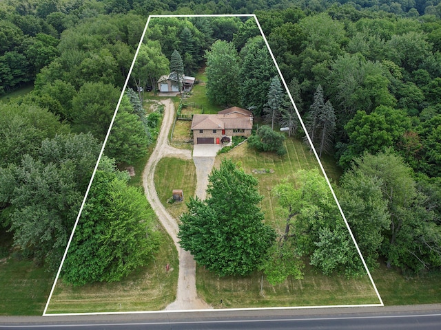 14083 M37, Battle Creek, MI 49017 - view of subject property featuring property parcel outlined and a heavily wooded area