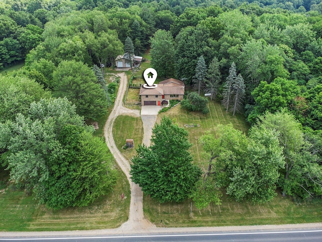 14083 M37, Battle Creek, MI 49017 - view of property location featuring a heavily wooded area