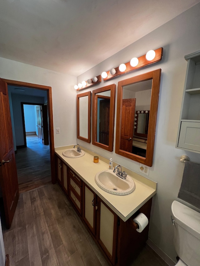 14083 M37, Battle Creek, MI 49017 - bathroom with double vanity and wood finished floors