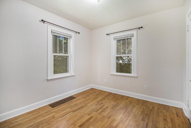 924 Royce Ave, Kalamazoo, MI 49001 - unfurnished room with light wood finished floors and baseboards