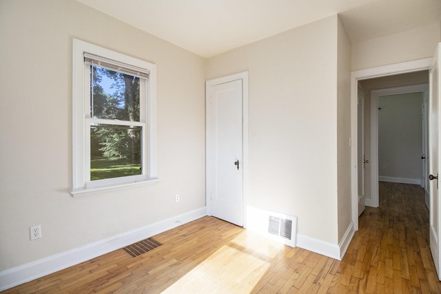 924 Royce Ave, Kalamazoo, MI 49001 - spare room featuring light wood-style floors and baseboards