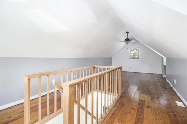 924 Royce Ave, Kalamazoo, MI 49001 - bonus room with wood-type flooring, a ceiling fan, vaulted ceiling, and a skylight