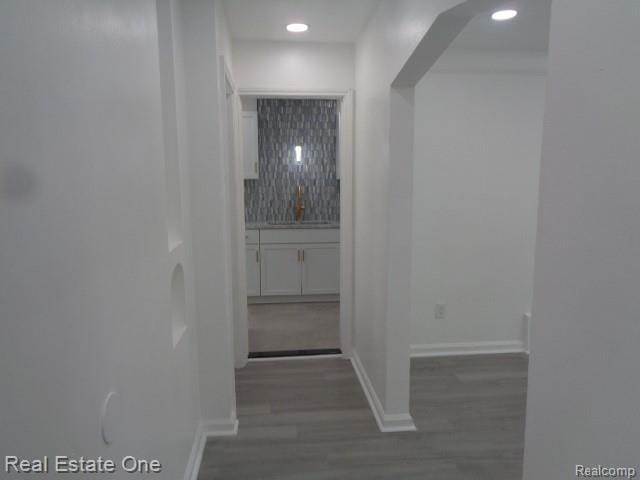18259 Pinehurst St, Detroit, MI 48221 - corridor with wood finished floors and recessed lighting