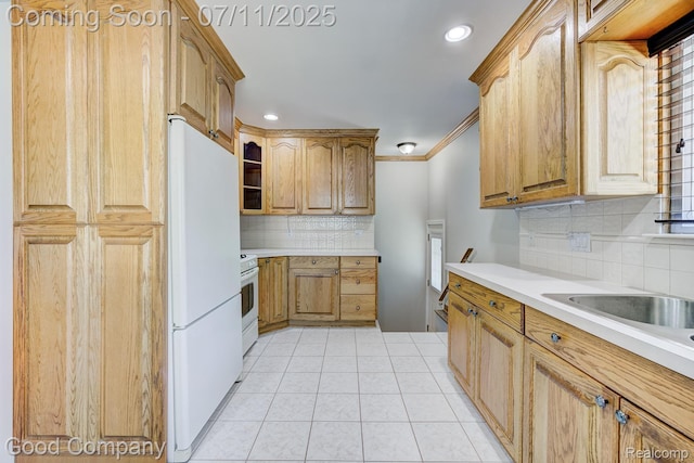 2416 Bonner St, Ferndale, MI 48220 - kitchen featuring white appliances, backsplash, light countertops, recessed lighting, and light tile patterned floors