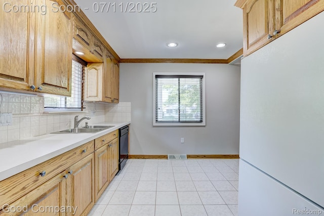 2416 Bonner St, Ferndale, MI 48220 - kitchen with freestanding refrigerator, decorative backsplash, ornamental molding, light countertops, and dishwasher