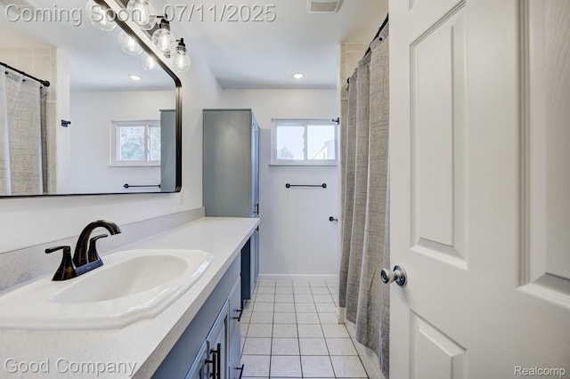 2416 Bonner St, Ferndale, MI 48220 - full bathroom with plenty of natural light, vanity, tile patterned flooring, and recessed lighting