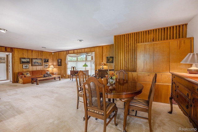 6400 N Rochester Rd, Rochester Hills, MI 48306 - dining area with wood walls and light colored carpet
