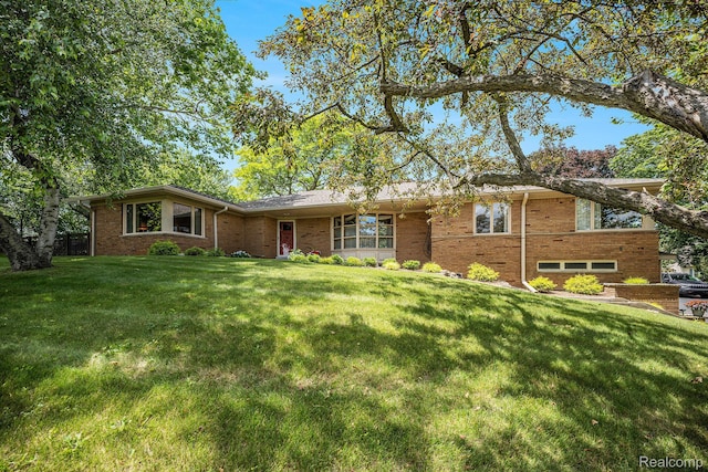 6400 N Rochester Rd, Rochester Hills, MI 48306 - ranch-style home featuring brick siding and a front yard