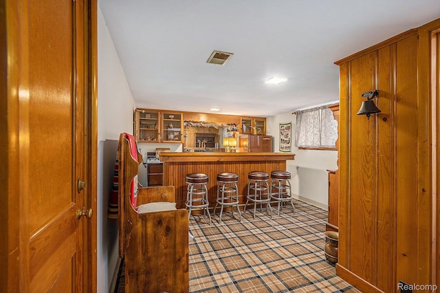 6400 N Rochester Rd, Rochester Hills, MI 48306 - indoor bar featuring refrigerator and baseboards