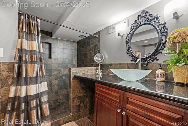 17022 Marguerite St, Beverly Hills, MI 48025 - full bathroom with tile walls, a walk in shower, and vanity
