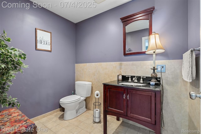 17022 Marguerite St, Beverly Hills, MI 48025 - half bath with tile walls, vanity, tile patterned floors, and wainscoting