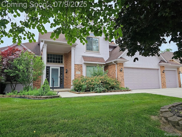 6942 Norton Dr, Troy, MI 48085 - view of front of home with brick siding, a front yard, driveway, an attached garage, and roof with shingles
