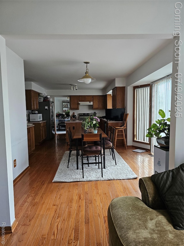 6942 Norton Dr, Troy, MI 48085 - dining room featuring wood finished floors