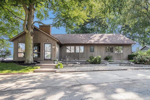 3265 Elmwood Beach Rd, Middleville, MI 49333 - view of front of property featuring a chimney and a shingled roof