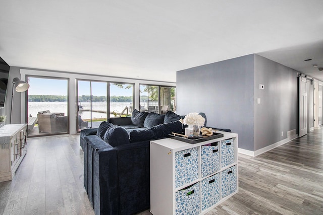3265 Elmwood Beach Rd, Middleville, MI 49333 - living area with light wood-style flooring and a water view