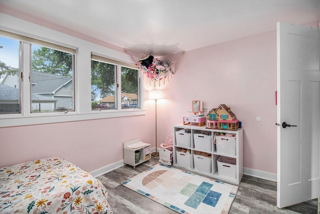 3265 Elmwood Beach Rd, Middleville, MI 49333 - bedroom with baseboards and wood finished floors
