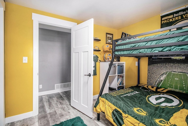 3265 Elmwood Beach Rd, Middleville, MI 49333 - bedroom with wood finished floors and baseboards