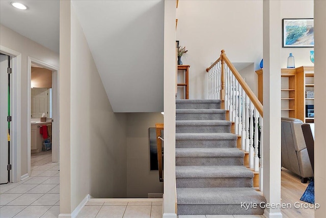46 Counts Cove Ct, Holland, MI 49424 - stairway featuring tile patterned flooring and recessed lighting