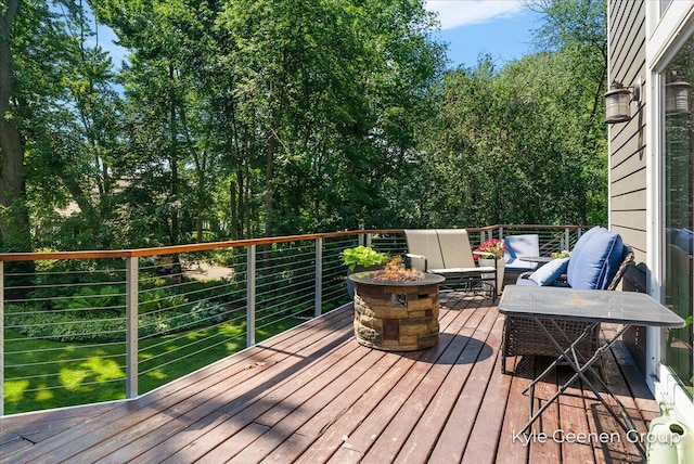 46 Counts Cove Ct, Holland, MI 49424 - deck with an outdoor living space with a fire pit
